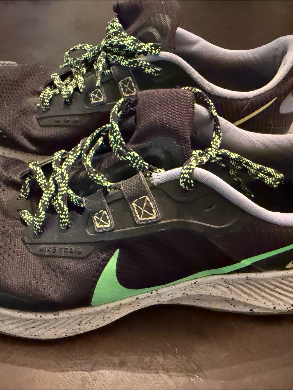 Nike Men’s Black Athletic Shoes with Green Accents